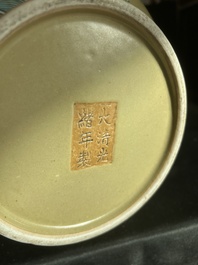 A Chinese famille rose enamelled teadust-glazed bottle vase with dragons, Qianlong mark, 19th C.