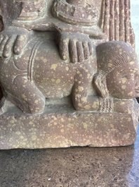 A large Indian red sandstone stupa pillar with a devata shown as a woman and lotus flowers, probably Matura region, ca. 2nd C. b.C - 2nd C.