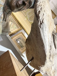 A large whale vertebra mounted on a wooden base, s.d.