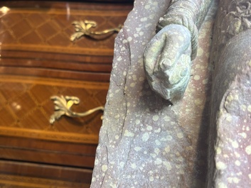 A large Indian red sandstone stupa pillar with a devata shown as a woman and lotus flowers, probably Matura region, ca. 2nd C. b.C - 2nd C.