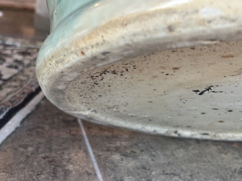 A large Chinese blue and white celadon-ground vase with a battle scene with immortals, 19th C.