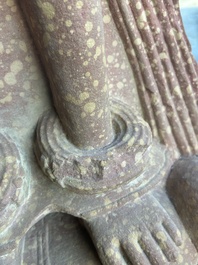 A large Indian red sandstone stupa pillar with a devata shown as a woman and lotus flowers, probably Matura region, ca. 2nd C. b.C - 2nd C.