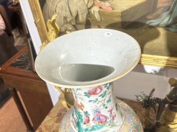 A Chinese famille rose vase with roosters among blossoming branches, 19th C.