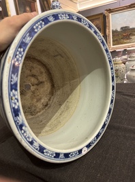 A Chinese blue and white jardini&egrave;re with figurative medallions, 19th C.