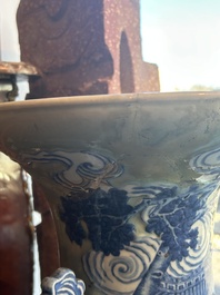 A large Chinese blue and white celadon-ground vase with a battle scene with immortals, 19th C.