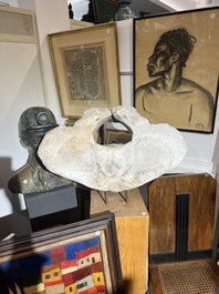 A large whale vertebra mounted on a wooden base, s.d.