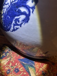 A large Chinese blue and white 'dragon medallion' fish bowl, Qianlong