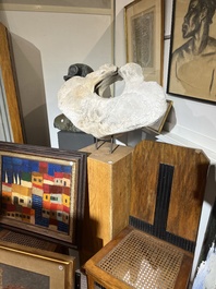 A large whale vertebra mounted on a wooden base, s.d.