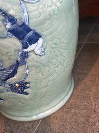 A large Chinese blue and white celadon-ground vase with a battle scene with immortals, 19th C.