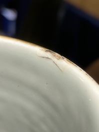 An exceptional pair of Chinese famille rose yellow sgraffito-ground bottle vases with applied design of antiquities, 19th C.