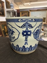 A Chinese blue and white jardini&egrave;re with figurative medallions, 19th C.