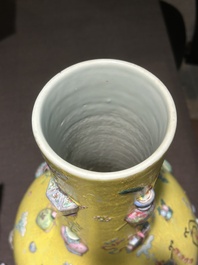 An exceptional pair of Chinese famille rose yellow sgraffito-ground bottle vases with applied design of antiquities, 19th C.