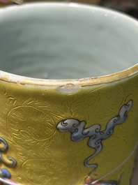 An exceptional pair of Chinese famille rose yellow sgraffito-ground bottle vases with applied design of antiquities, 19th C.