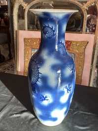 A Chinese blue and white 'dragons' vase, 19th C.