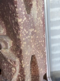 A large Indian red sandstone stupa pillar with a devata shown as a woman and lotus flowers, probably Matura region, ca. 2nd C. b.C - 2nd C.