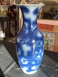 A Chinese blue and white 'dragons' vase, 19th C.