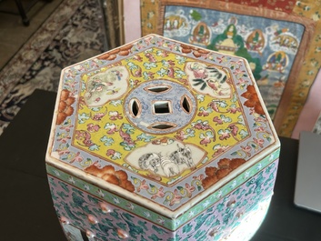 A hexagonal Chinese famille rose garden seat with figural design, 19th C.