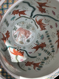 A Chinese famille rose Dayazhai style fish bowl with dragons among blossoming branches, 19th C.