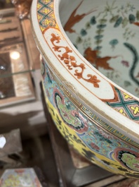 A Chinese famille rose Dayazhai style fish bowl with dragons among blossoming branches, 19th C.