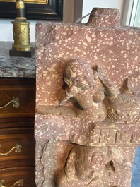 A large Indian red sandstone stupa pillar with a devata shown as a woman and lotus flowers, probably Matura region, ca. 2nd C. b.C - 2nd C.