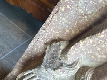 A large Indian red sandstone stupa pillar with a devata shown as a woman and lotus flowers, probably Matura region, ca. 2nd C. b.C - 2nd C.