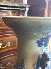 A large Chinese blue and white celadon-ground vase with a battle scene with immortals, 19th C.