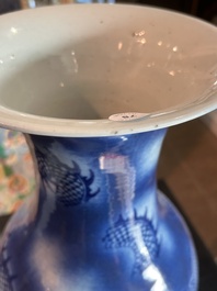 A Chinese blue and white 'dragons' vase, 19th C.