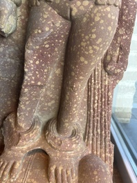 A large Indian red sandstone stupa pillar with a devata shown as a woman and lotus flowers, probably Matura region, ca. 2nd C. b.C - 2nd C.