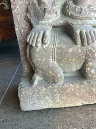 A large Indian red sandstone stupa pillar with a devata shown as a woman and lotus flowers, probably Matura region, ca. 2nd C. b.C - 2nd C.