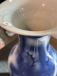 A Chinese blue and white 'dragons' vase, 19th C.