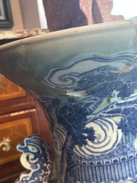 A large Chinese blue and white celadon-ground vase with a battle scene with immortals, 19th C.