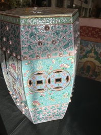 A hexagonal Chinese famille rose garden seat with figural design, 19th C.