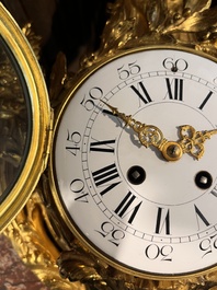 A French gilt bronze Louis XVI style cartel clock with floral design, late 19th C.