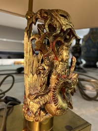 Two pairs of table lamps with South-Chinese reticulated gilt wooden carvings, 20th C.