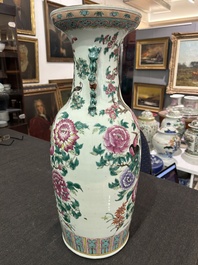 A Chinese famille rose vase with phoenixes and pheasants among blossoming branches, 19th C.