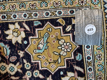 A Persian Qom (Qum/Ghom) silk rug with hunting scenes, 20th C.