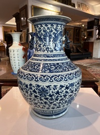 A large Chinese blue and white 'hu' vase with phoenixes and lotus scrolls, 19th C.