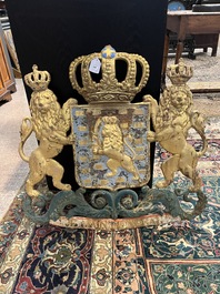 A Dutch polychrome and gilt cast iron 'Je maintiendrai' wall plaque, ca. 1900