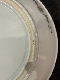 A Chinese famille rose dish with ladies relaxing in a palace garden, Qianlong mark, 20th C.