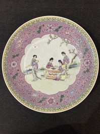 A Chinese famille rose dish with ladies relaxing in a palace garden, Qianlong mark, 20th C.