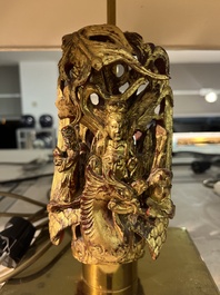 Two pairs of table lamps with South-Chinese reticulated gilt wooden carvings, 20th C.