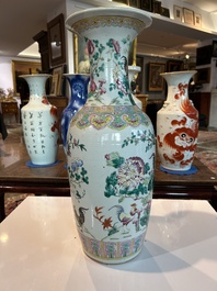 A Chinese famille rose vase with roosters among blossoming branches, 19th C.