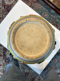 An exceptional pair of Chinese famille rose yellow sgraffito-ground bottle vases with applied design of antiquities, 19th C.