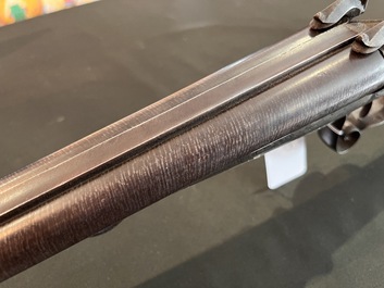 A French double-barreled pinfire hunting rifle with damask barrels and engraved breechblocks, marked, second half 19th C.