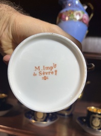 A 27-piece porcelain coffee service with the arms of the Second French Empire under Napoleon III, S&egrave;vres mark, France, 19th C.