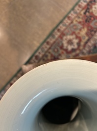 Two Chinese iron-red 'Buddhist lions' vases, 19th/20th C.