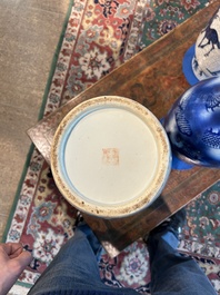 Two Chinese iron-red 'Buddhist lions' vases, 19th/20th C.