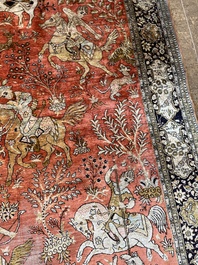 A Persian Qom (Qum/Ghom) silk rug with hunting scenes, 20th C.