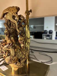 Two pairs of table lamps with South-Chinese reticulated gilt wooden carvings, 20th C.