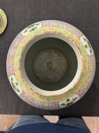 A Chinese famille rose 'antiquities' vase and cover, 19th C.